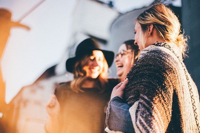 Women laughing with eachother