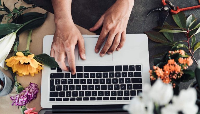 Person typing on laptop